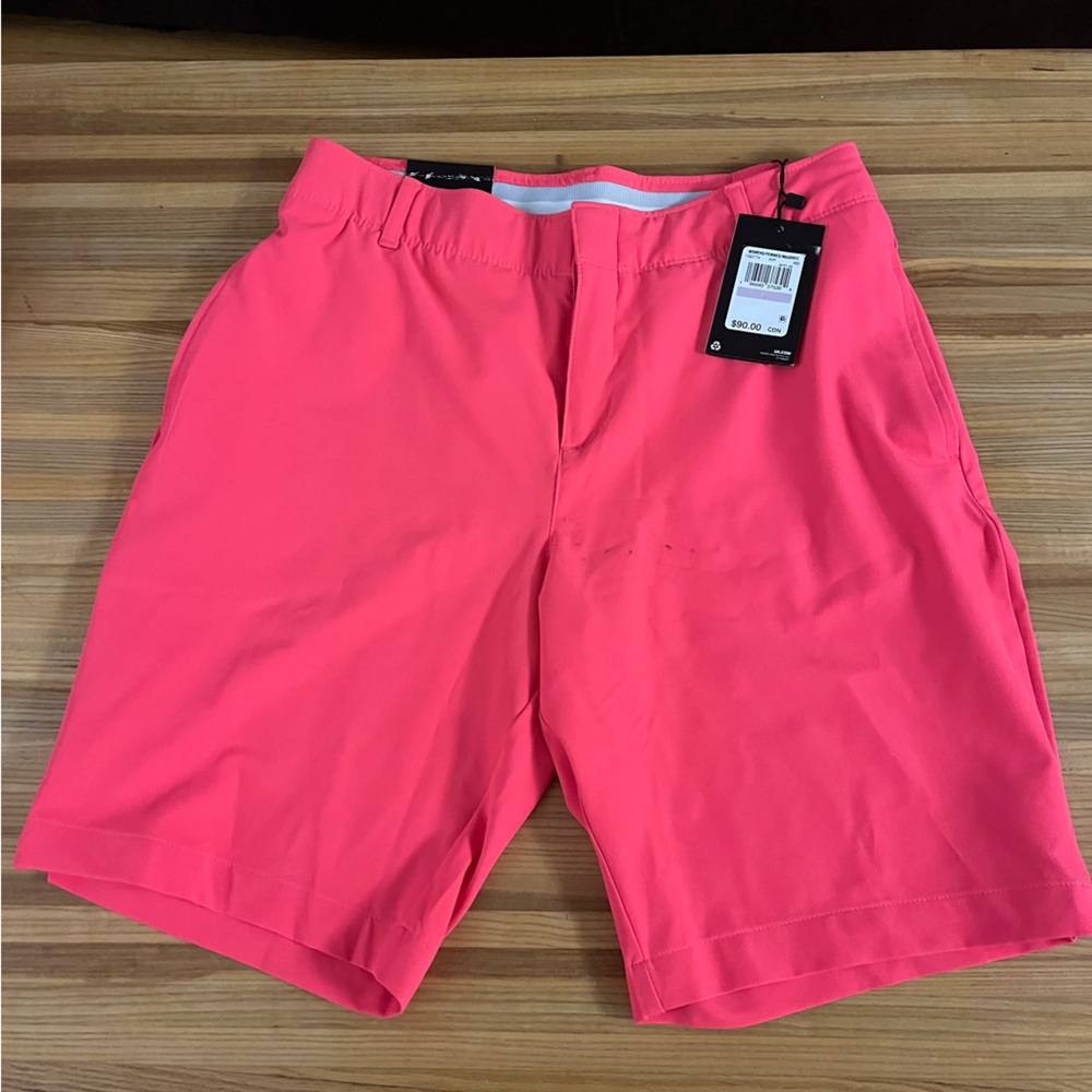 Hot pink Under armour golf shorts 9 inch size 6 brand new with tags.